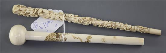 Three Japanese ivory parasol handles and two small boxes and covers, early 20th century, 3.5cm - 23.7cm